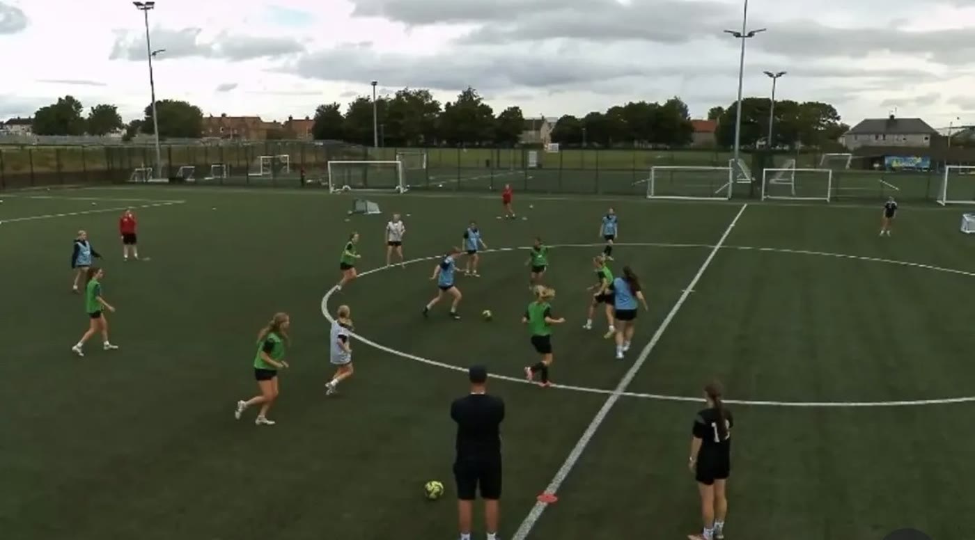 Players in a small sided game on the 3G