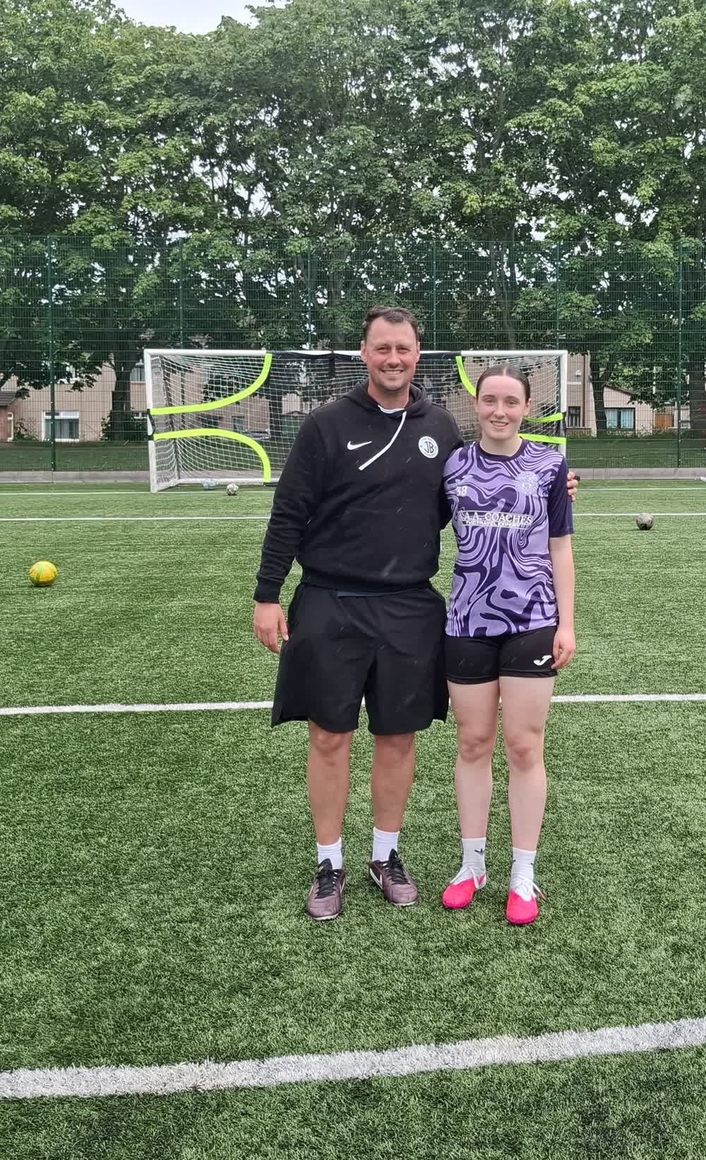 Jonathan with one of his players on the 3G