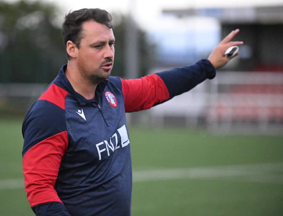Jonathan Brown coaching from the touchline