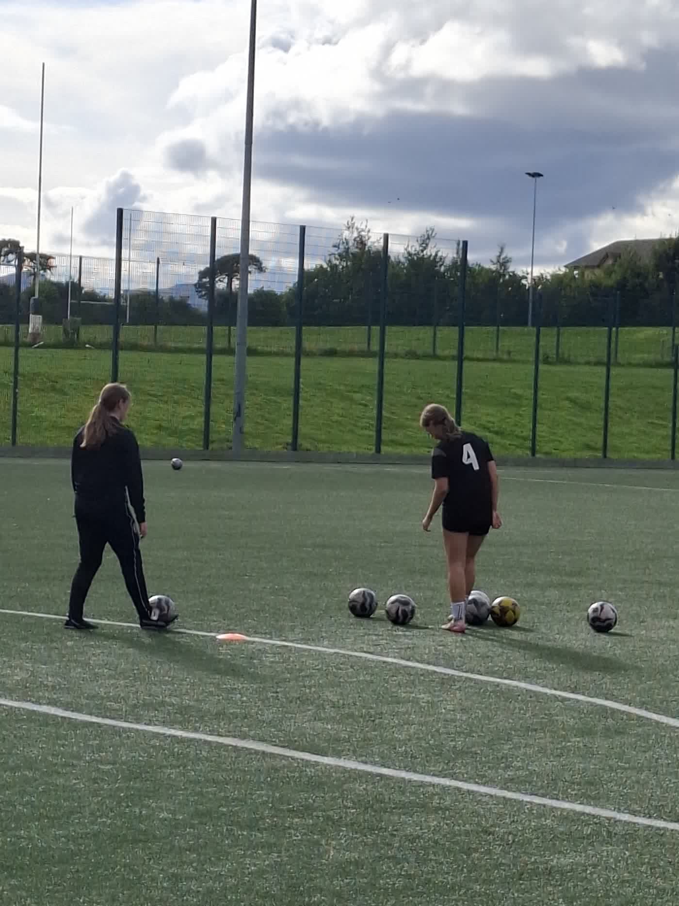 Two players working through a finishing practice